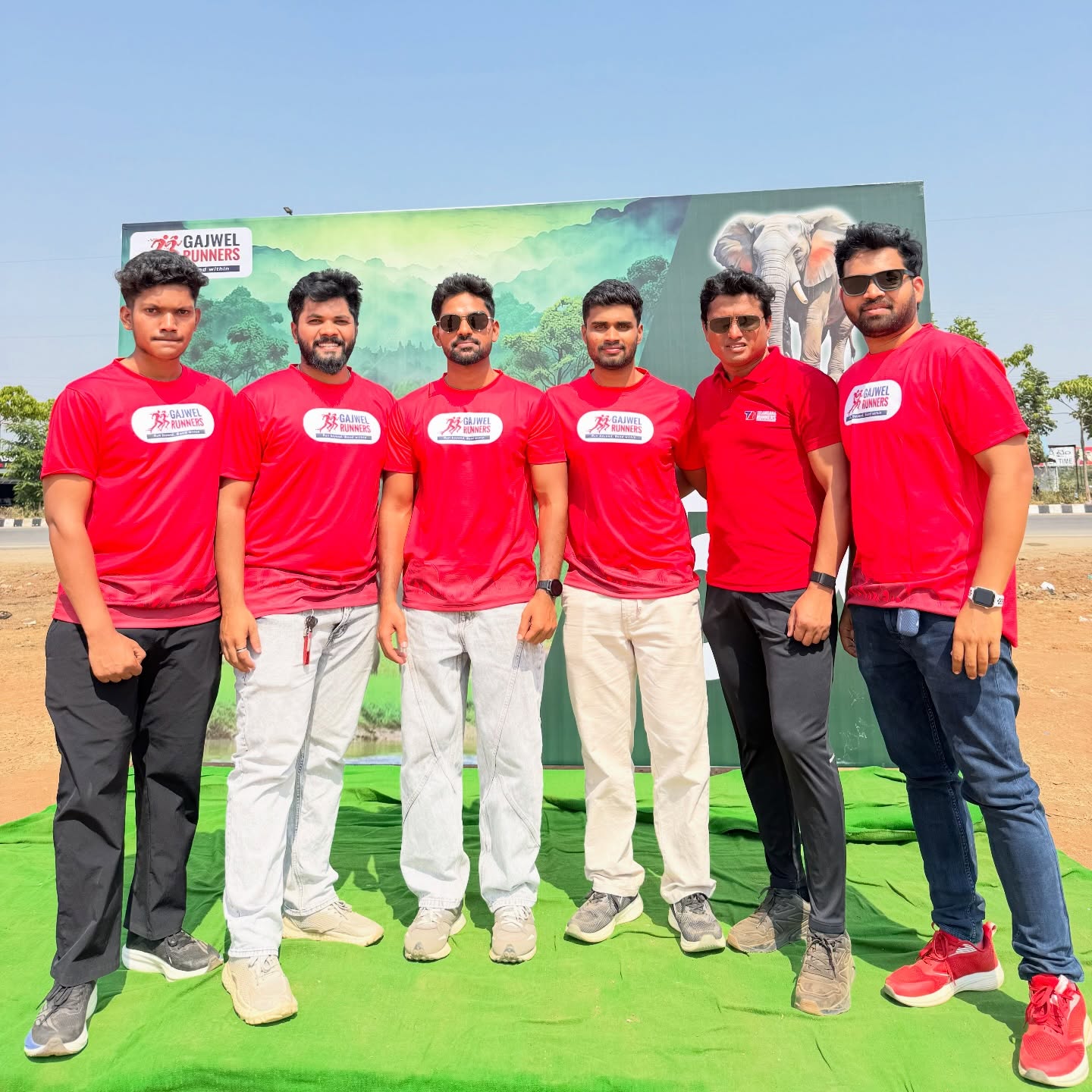 Ravi with the Gajwel Runners team at a community event